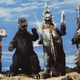 From left: Jet Jaguar, Godzilla, Gigan, and Megalon goof around in-between takes.